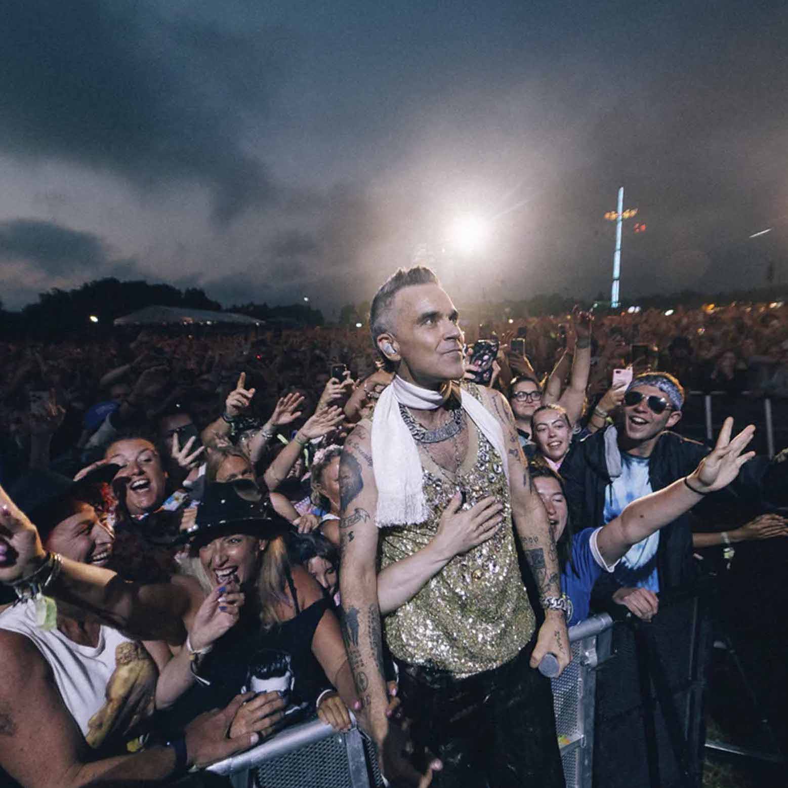 still of robbie williams at the isle of wight festival 2023